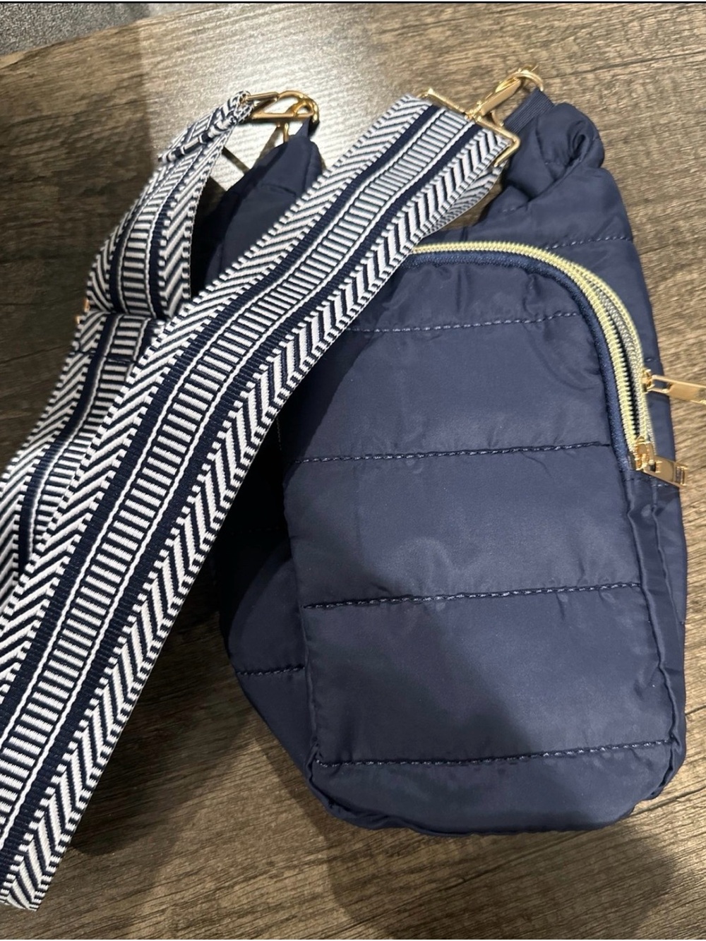 Navy Quilted Crossbody Bag with Patterned Strap for water bottle